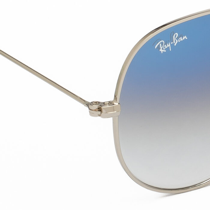 "Ray-Ban Aviator sunglasses with gradient blue to grey lenses and gold frame