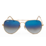 "Ray-Ban Aviator sunglasses with gradient blue to grey lenses and gold frame
