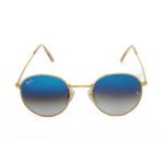 Ray-Ban round sunglasses with gold frame and gradient blue lenses